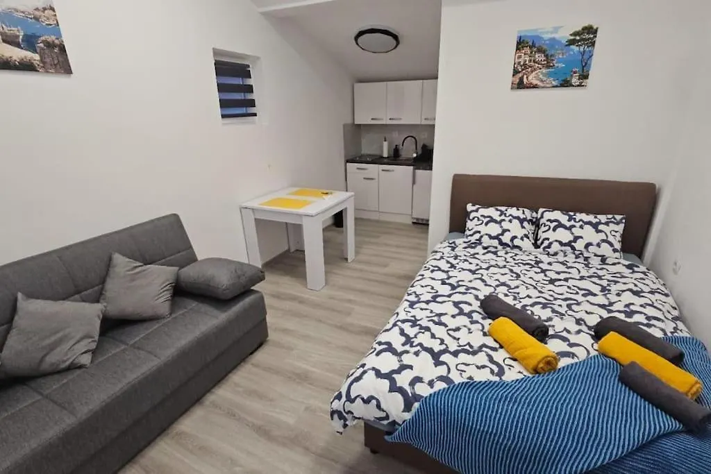 Apartmani Kuzman kontakti